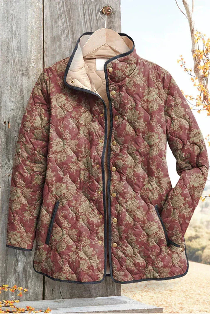 Berit Steppjacke mit Blüten in Rostrot – warmes Rostrot mit dichten kleinen Blüten in Creme und Grün – Stefan Berlin