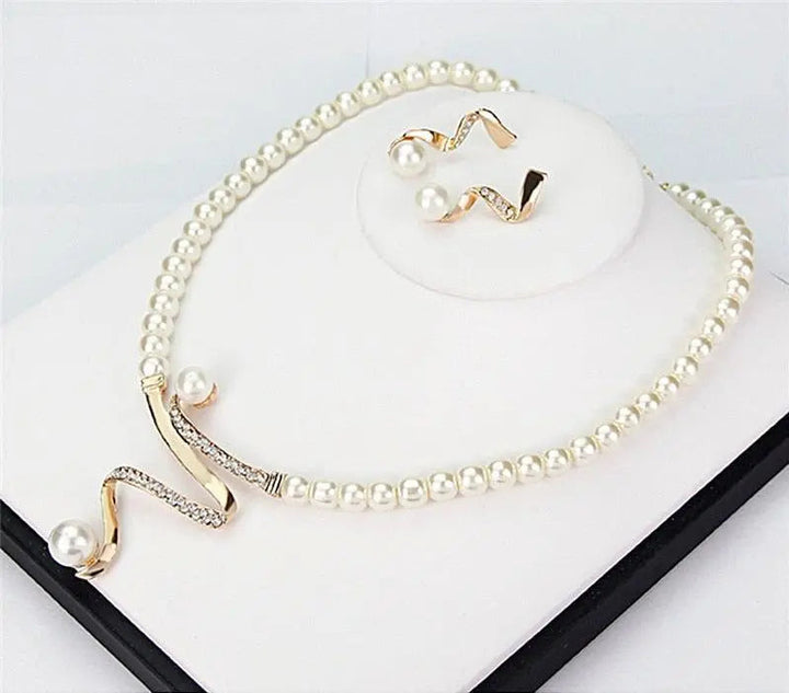 Set aus Kette und Ohrringen – Stefan Berlin