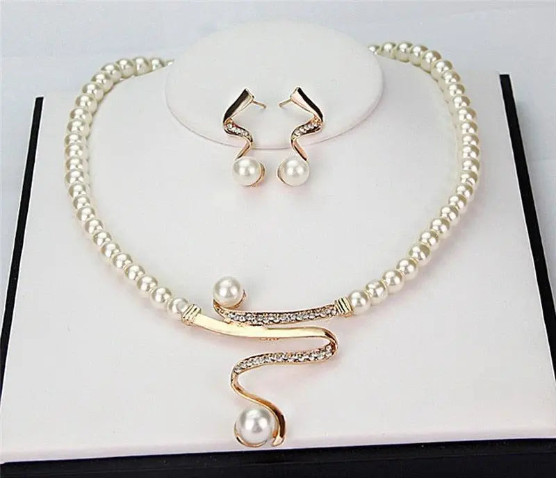Set aus Kette und Ohrringen – Stefan Berlin