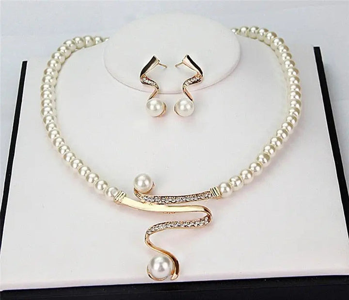 Set aus Kette und Ohrringen – Stefan Berlin