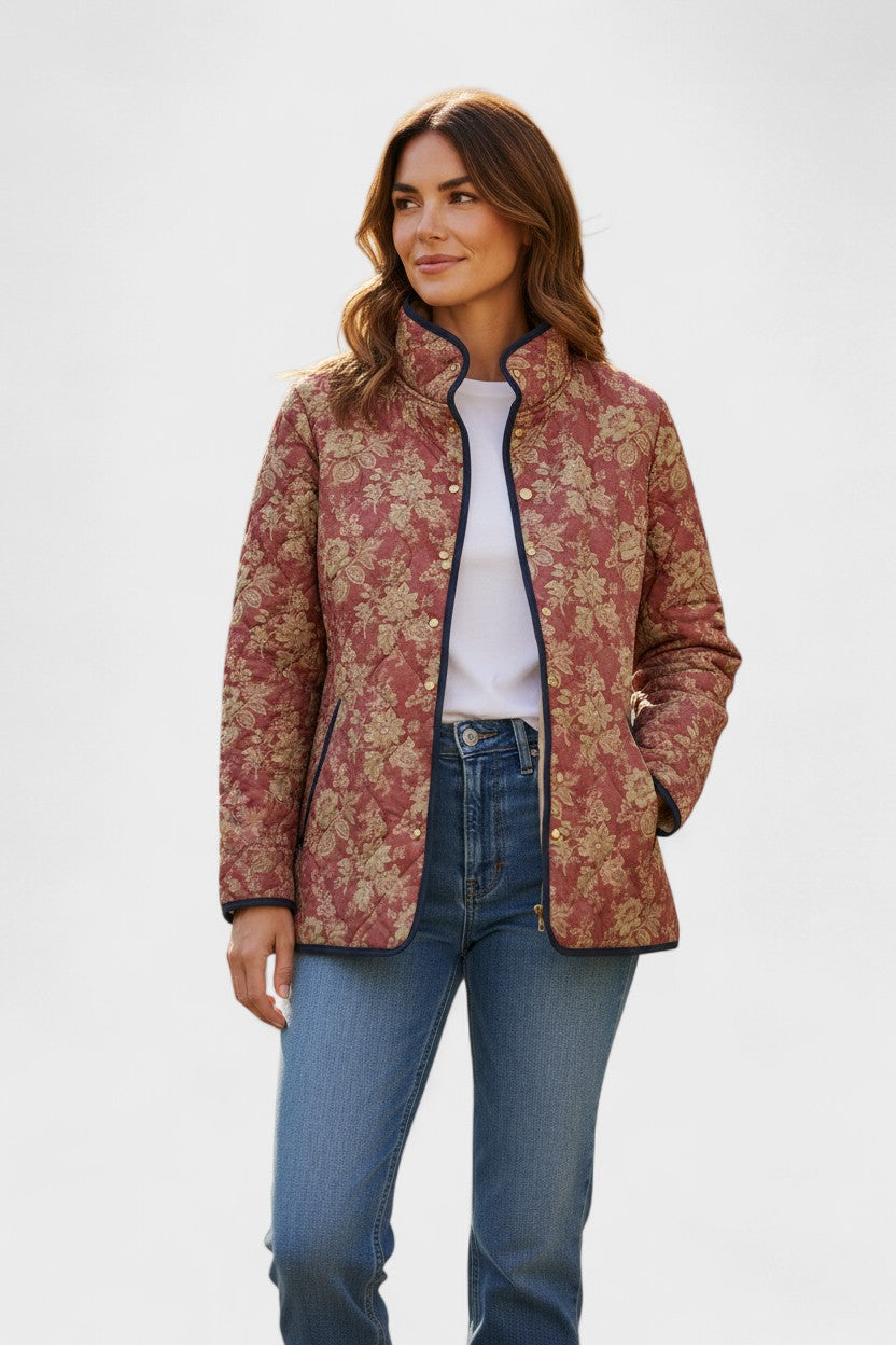 Berit Steppjacke mit Blüten in Rostrot – warmes Rostrot mit dichten kleinen Blüten in Creme und Grün – Stefan Berlin